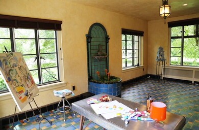 A fountain and colorful tile present a lovely back