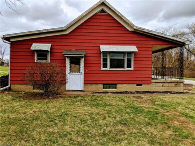 Left side of home showing separate entrance to bas
