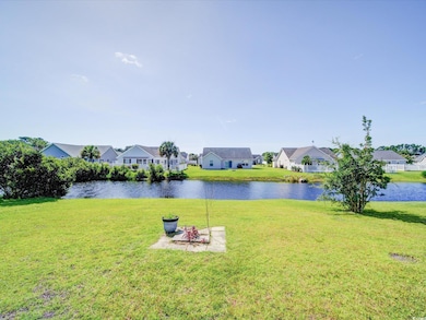 Water view featuring nearby suburban area