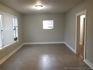 Living room toward dining room.  Pass thru to kitc