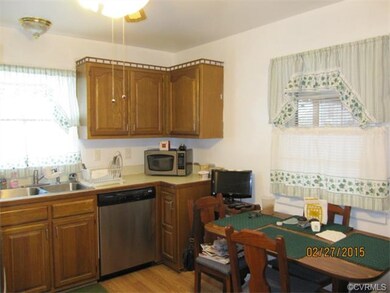 Eat-in kitchen with plenty of cabinets and newer s