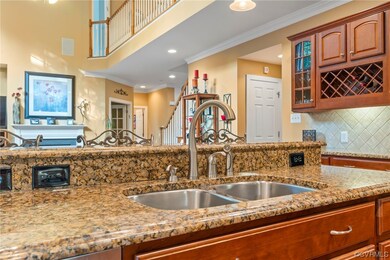 Kitchen featuring dark stone countertops, ornament