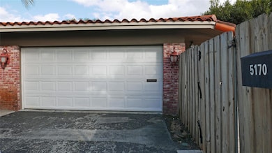  2 car garage with storage room