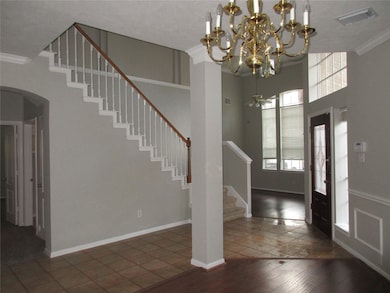 View from formal dining room towards front den or