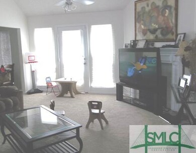 Living Room. Living room has cathedral ceiling, ce