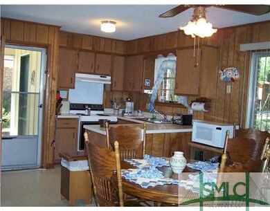 Kitchen. Dining in kitchen. Refrigerator and stove
