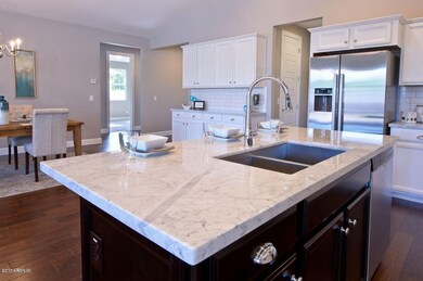 Kitchen looking in to dining