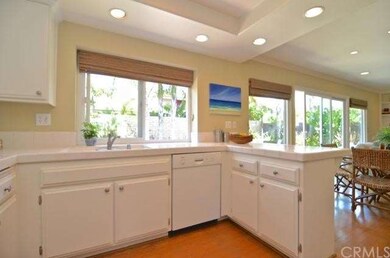 Recessed lighting, and contemporary shades lend a 