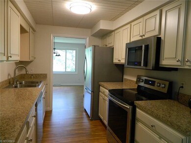 New Kitchen w/stainless steel appliances, wood flo