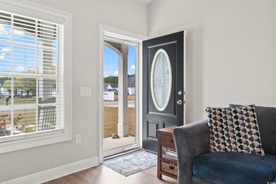 Entrance foyer with baseboards, a healthy amount o
