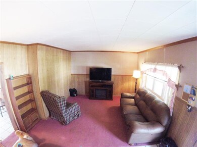 The expansive living room boasts an oversized wind