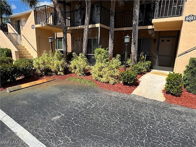 View of exterior entry featuring stucco siding