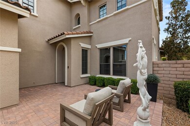 View of courtyard patio near front entrance.