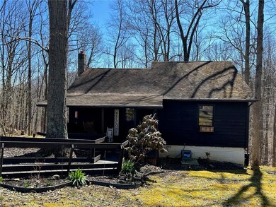 Front of house, much larger than looks.