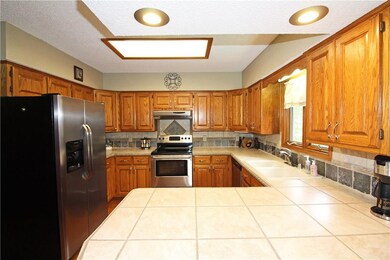 Great kitchen with a lot of cabinets and 2 pantries just off the kitchen.