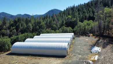 Land and greenhouses
