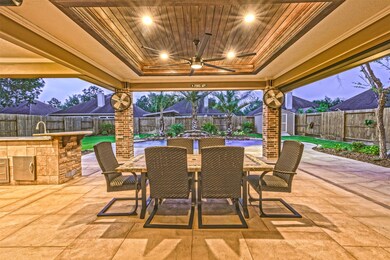 Amazingly large 26x23 back covered patio with comm
