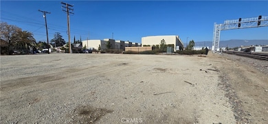 Railroad tracks follow back border of property.