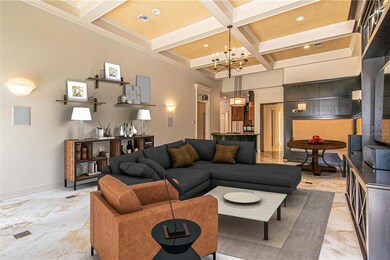 Family room with high, coffered ceilings, banquett