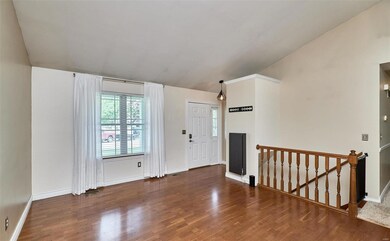 Great Room has an open staircase to the finished L
