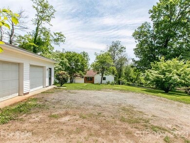 Oversized 2 car garage with workshop space