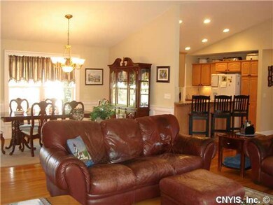 Living Room HARDWOODS AND CERAMIC FLOORS THRU-OUT 