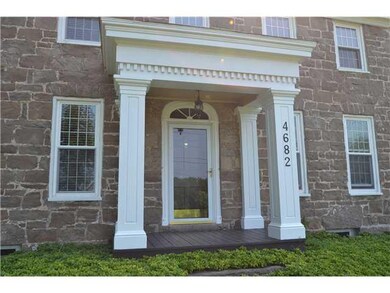 Exterior Front. Ornate front entry.