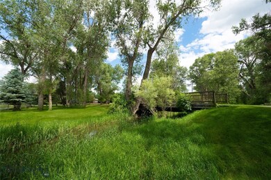 Charming Entryway bridge over Baker Creek.
