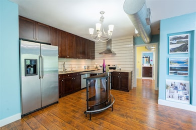 Granite countertops, upgraded cabinets and exposed