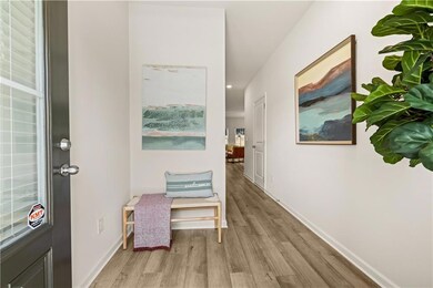 Hall featuring light hardwood / wood-style floors