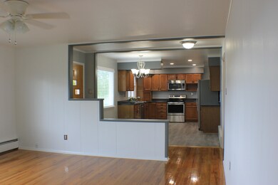Upstairs living room view to kitchen