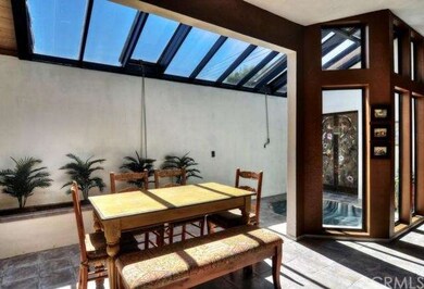 Outdoors is brought inside with lots of natural light (retractable awnings included) and indoor spa!