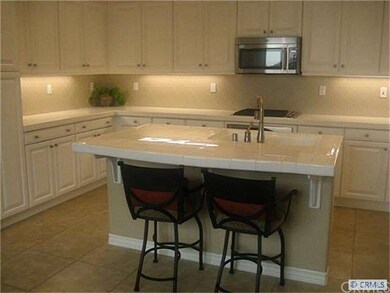 Tiled full back splash is an upgrade.  Lots of cou