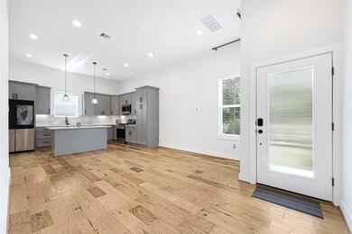 Bright and airy living space featuring high ceilin