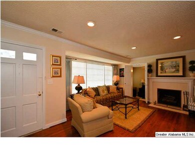 Guests are welcomed into living room.