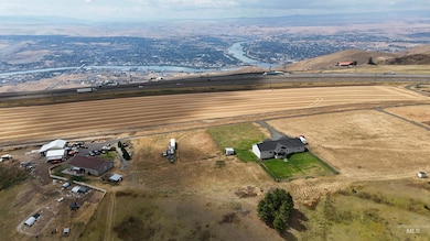 Aerial view of sparsely populated area featuring a mountainous background