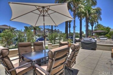 Enjoy the palm tree lined street. Look west to oce
