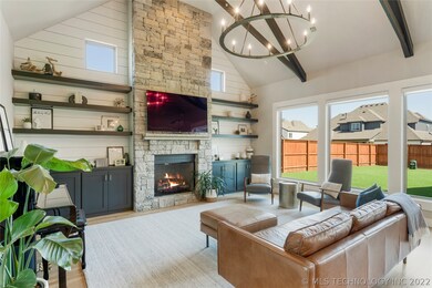 Light and bright great room boasts vaulted ceiling