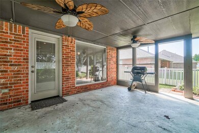Partially enclosed patio to break the wind and weather