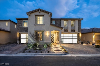 View of front of home featuring stucco siding, an
