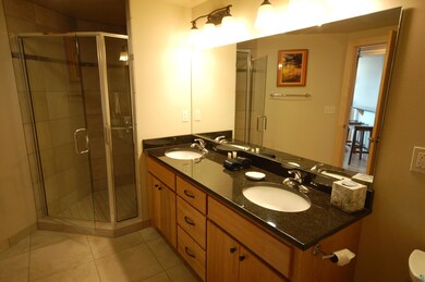 Bathroom with tile patterned flooring, vanity, and