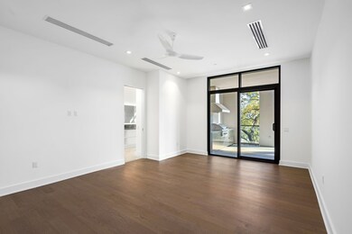The primary bedroom is its own world between the e