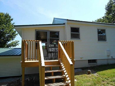 Exterior Back. New Windows