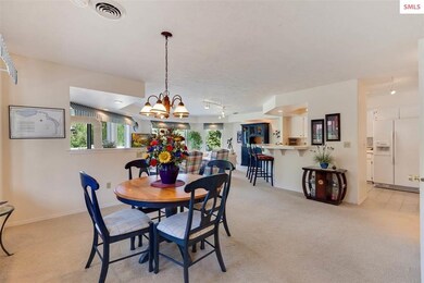 Open dining area close to living room and kitchen