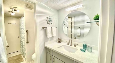 Updated bathroom with quartz countertop and underm