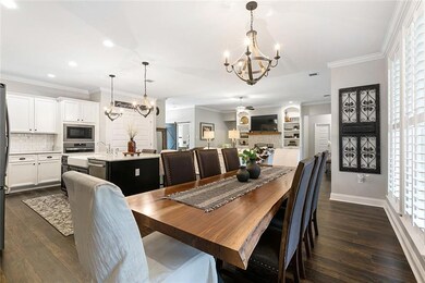 Dining opens to kitchen area.