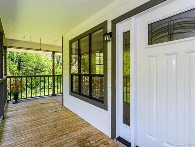 A lovely wrap around porch ready for your rockers 