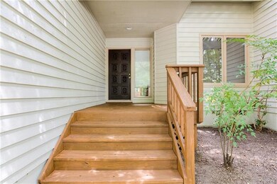 Newly stained front door and front Porch!