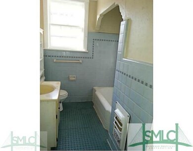 Bathroom. A true blue bathroom with an alcove tub 