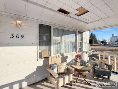 309 N Logan Ave, Fleming, CO 80728 - photo 2